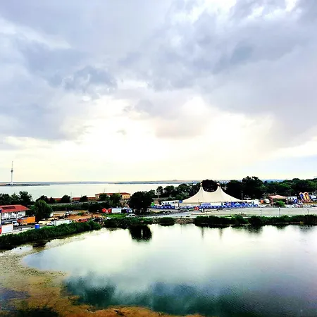 Adriano Pe Plaja Belona إيفوري نورد